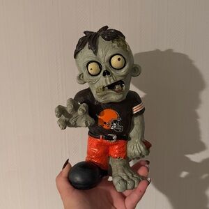 NFL Cleveland Browns-themed resin Zombie Figurine with Black and Orange Attire